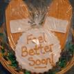A 3 cookie Gourmet Sugar Cookie Basket featuring "bandages" with a %u201Cmessage cookie%u201D)